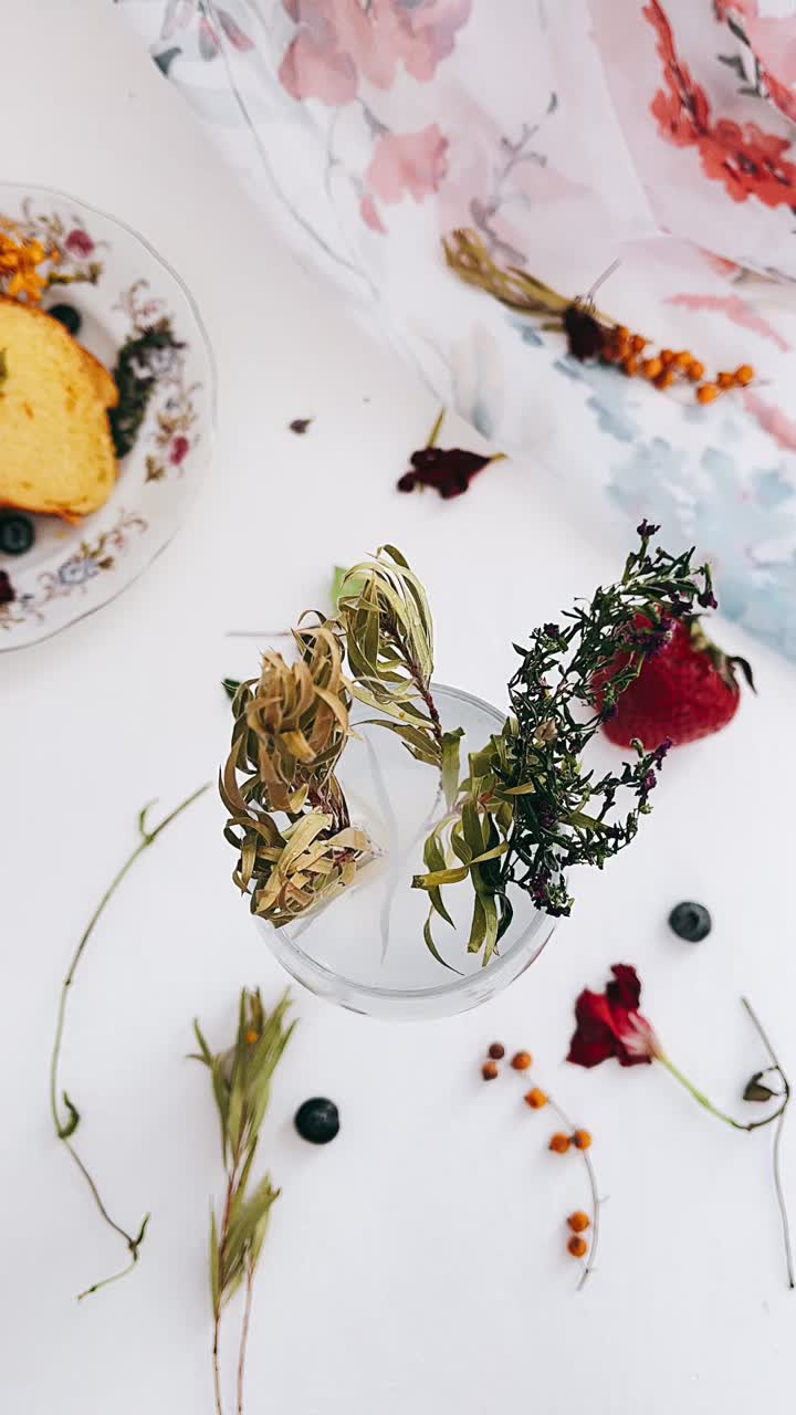 Delicate Floral Arrangement with Cake and Berries