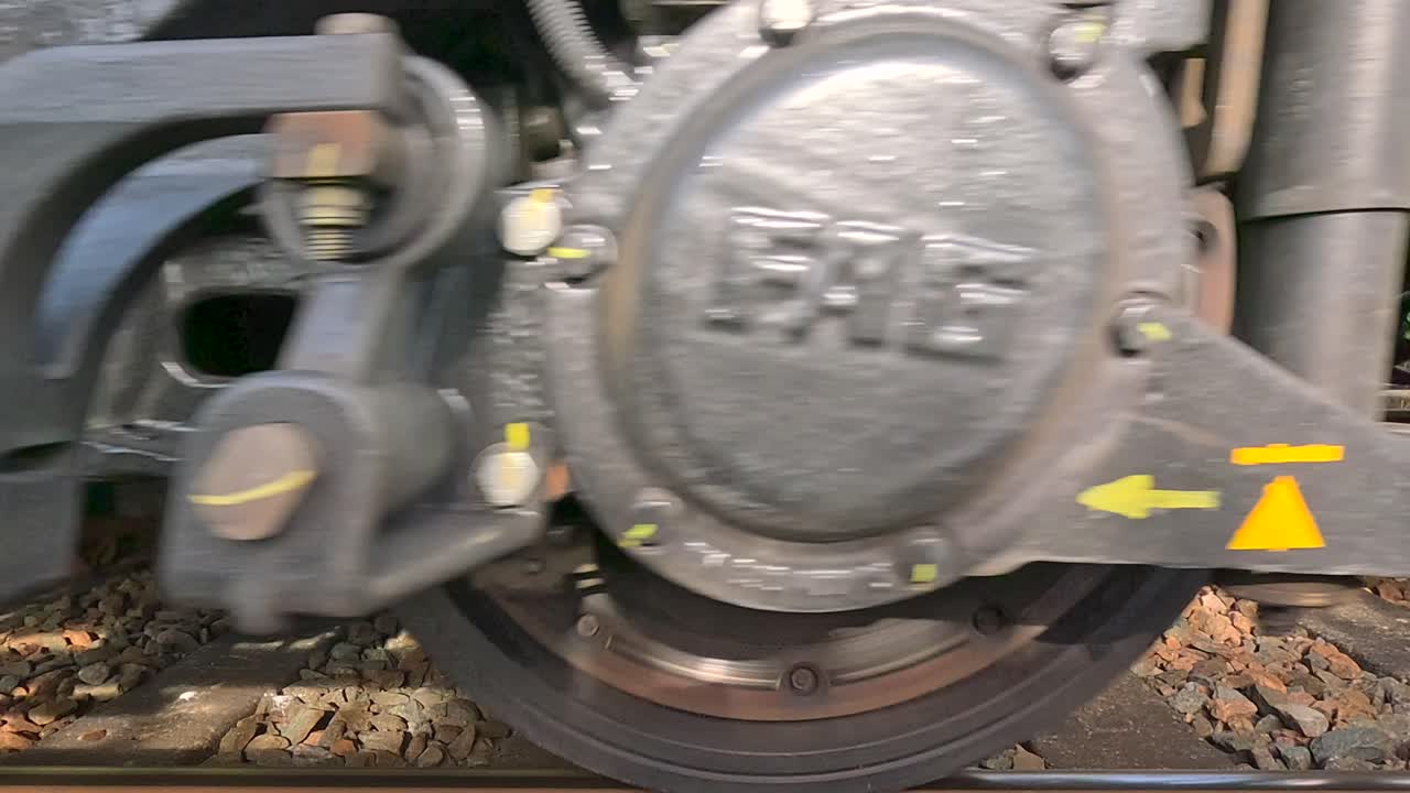 Track level view of train wheels as the train accelerates out of the station. Norfolk UK.