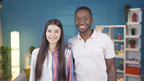 Portrait-of-beautiful-young-couple-in-love-with-each-other.-Multi-Ethnic-marriage.