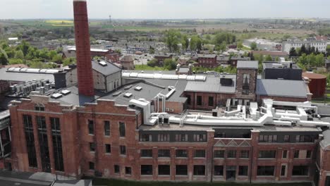 Facade-Of-Hotel-Building-With-Smokestack