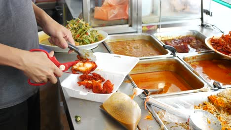 preparing malaysian/indian street food