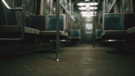 inside of the old non-modernized subway car in usa