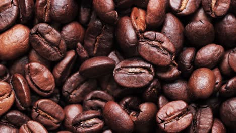 roasted coffee beans background. video loop. close-up