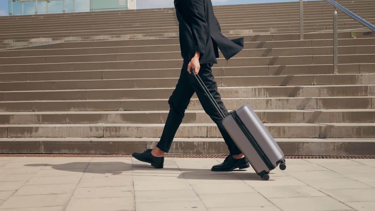 Tourist man with suitcase baggage in spain, A traveler with luggage suit jacket on business street go to a hotel, business office, airport terminal, enjoying the vibrant atmosphere