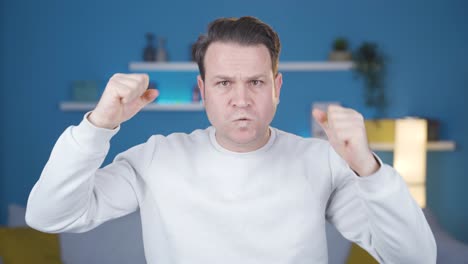 The angry man is going crazy at home, he can&#039;t control his anger, He is disappointed.