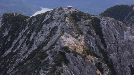 reveal of lake walchen below herzogstand and backdrop bavarian alps