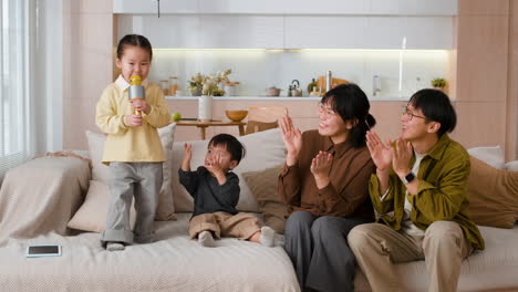 family singing and celebrating