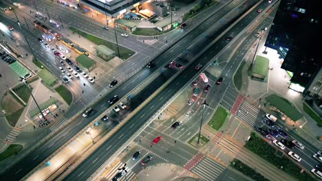 top down night city roads with cars driving aerial view