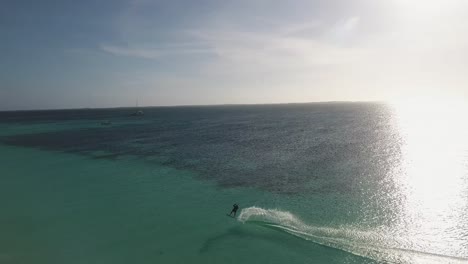 SUNSET-BEACH-KITESURF-exotic-place-Caribbean-island,-aerial-shot-endless-sun-Crasqui-Los-Roques