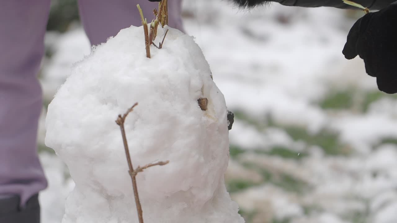 Building a small snowman