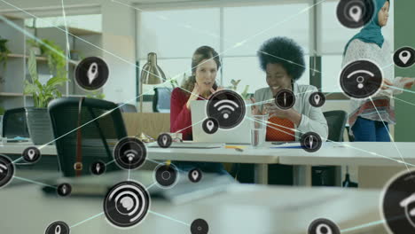 animation of network of connections with wifi icons over diverse business people in office