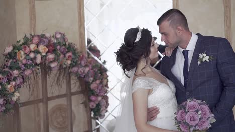 wonderful-wedding-couple-with-bouquet-arms-slow-motion