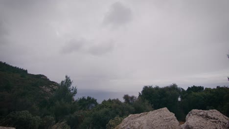 stormy clouds and wind over mediterranean coastal landscape time lapse