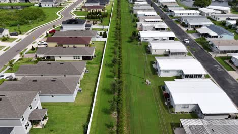 aerial view of a neighborhood with mobile homes and houses