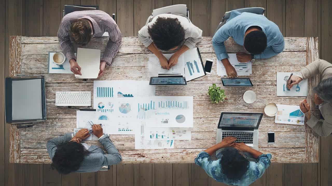 Team collaborates on data analysis in a modern office space