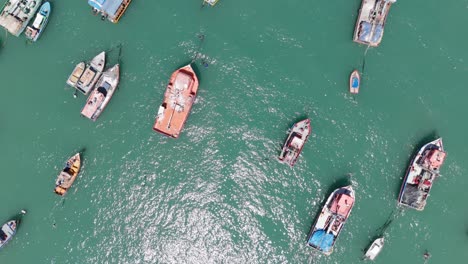 aerial over moored fishing boats in port of san antonio in chile