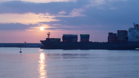 ship passing through an industrial port