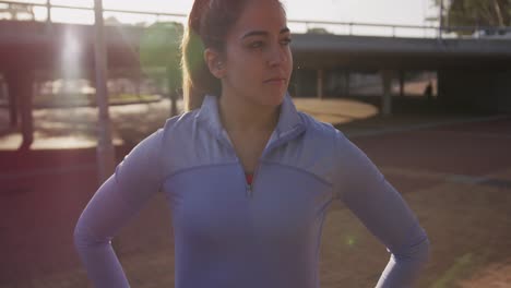 Caucasian-woman-standing-alone-in-a-park