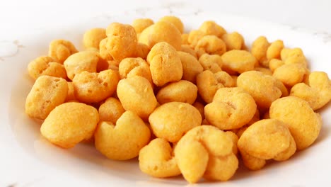 crispy cheese puffs on a plate