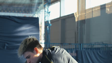 man training in a sports facility