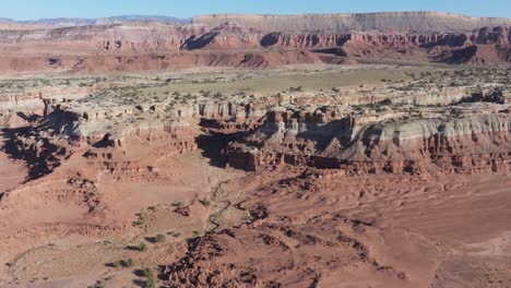 slow moving aerial shot of a mesa  desert