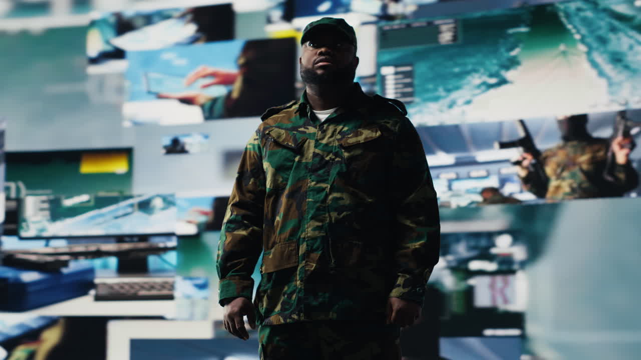 Black army officer working in a virtual war zone with digital satellite data