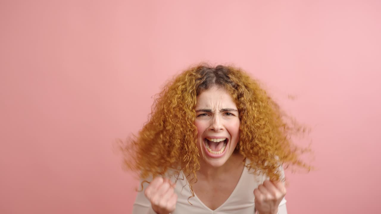 Woman expressing different levels of anger on pink background
