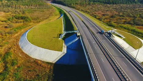 Cars-traffic-on-highway-road.-Drone-view-highway-bridge-landscape