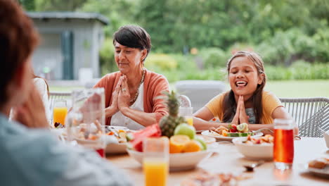 praying, food and happy family outdoor with love