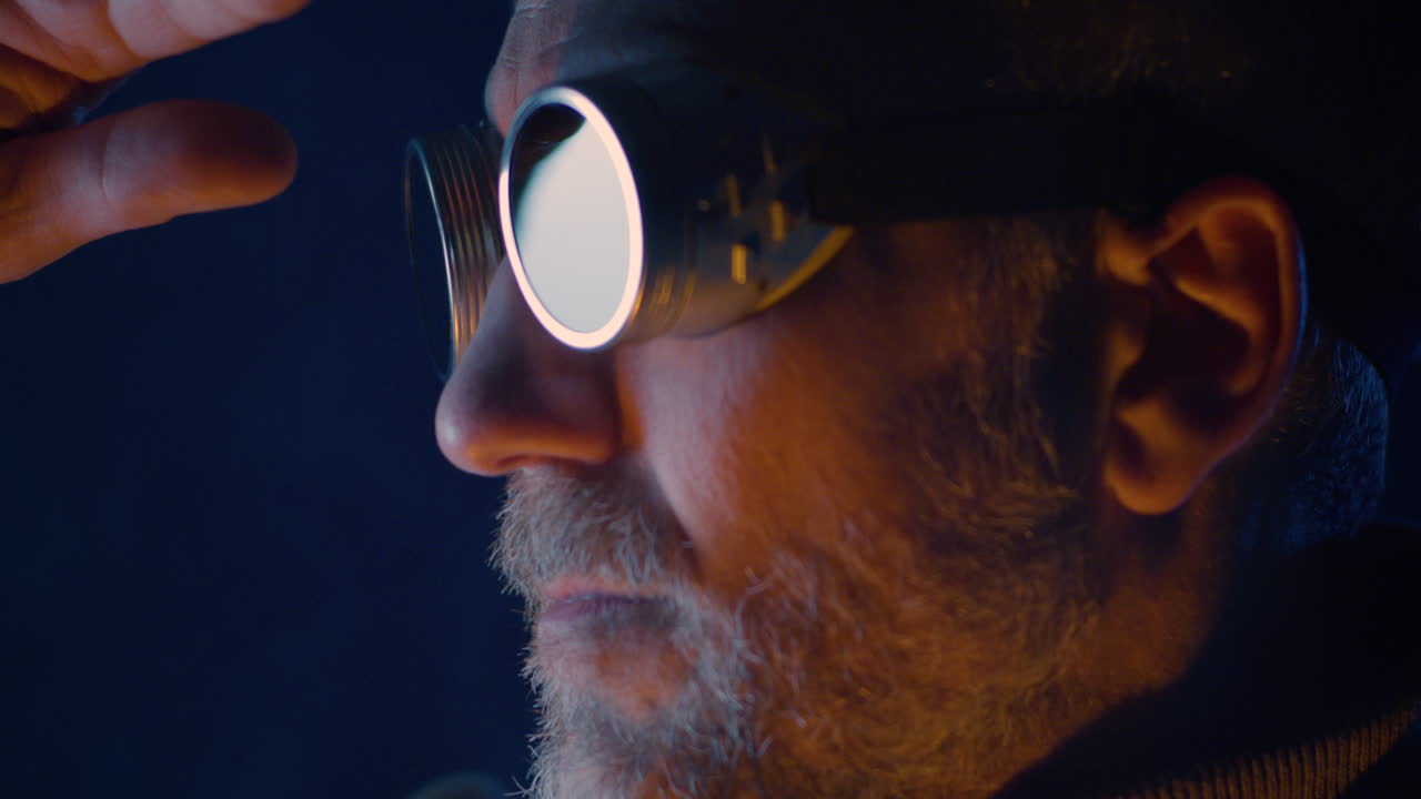 Man with Welding Glasses in Profile View