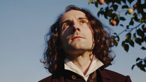 man under an apple tree