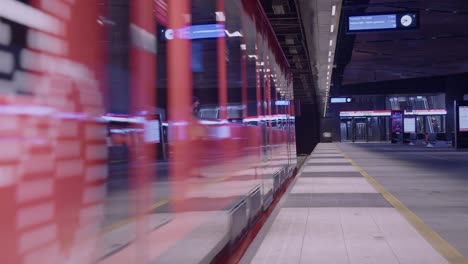 public transit train departs underground subway station in modern city