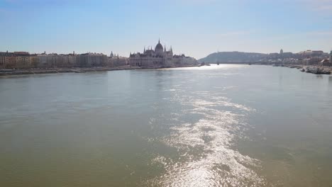 center of budapest with hungarian parliament and szechenyi chain bridge over the danube river. sunny winter day