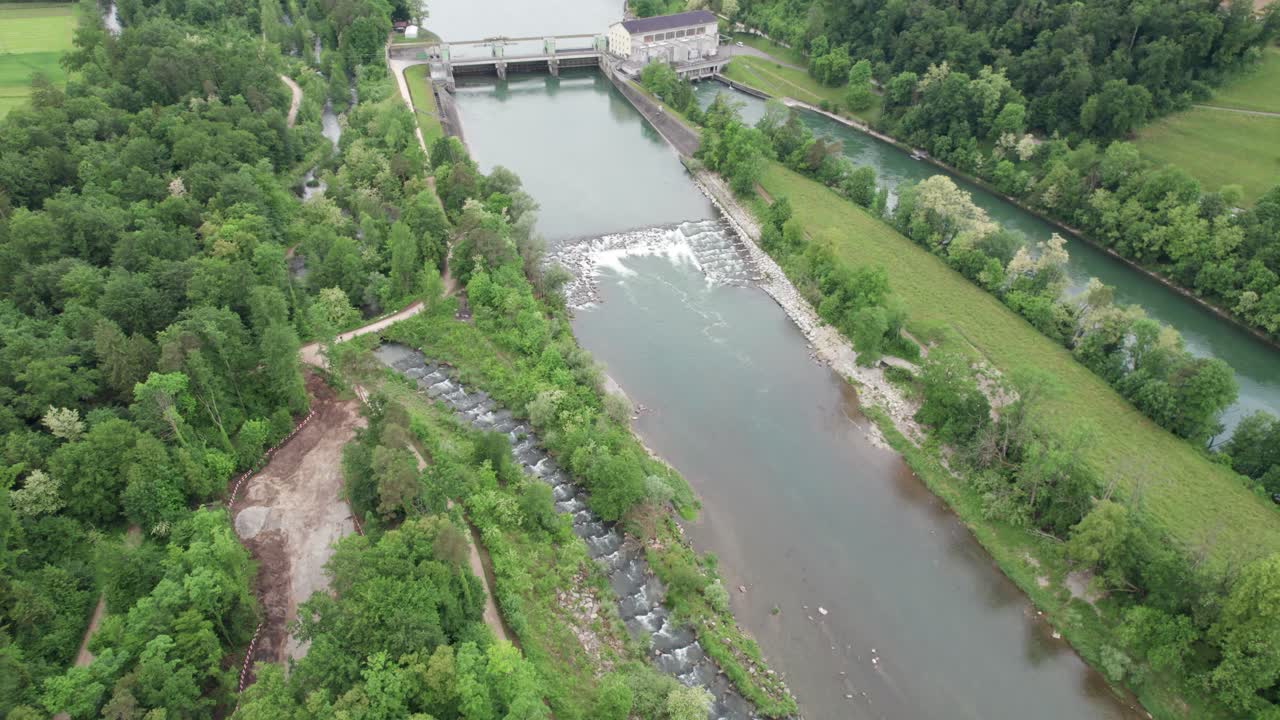 Hydropower station with fish ladder, in Aarau, Switzerland. Green energy power generation with ecological restoration measures