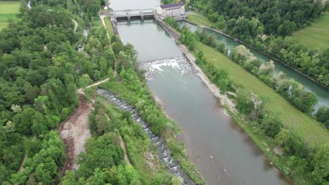 hydropower station with fish ladder, in aarau, switzerland. green energy power generation with ecological restoration measures