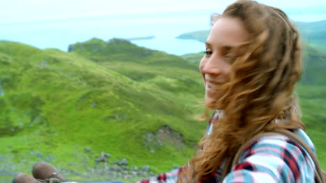 woman hiking in scottish highlands