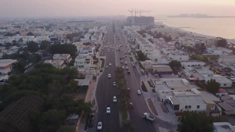 aerial view of a city street at sunset