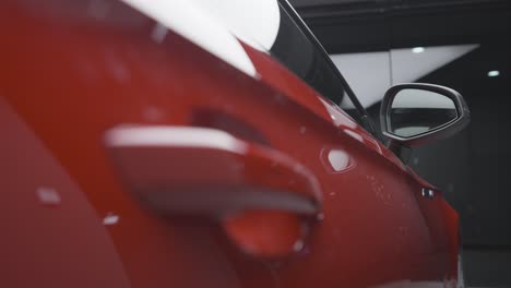 close-up of a red car's side