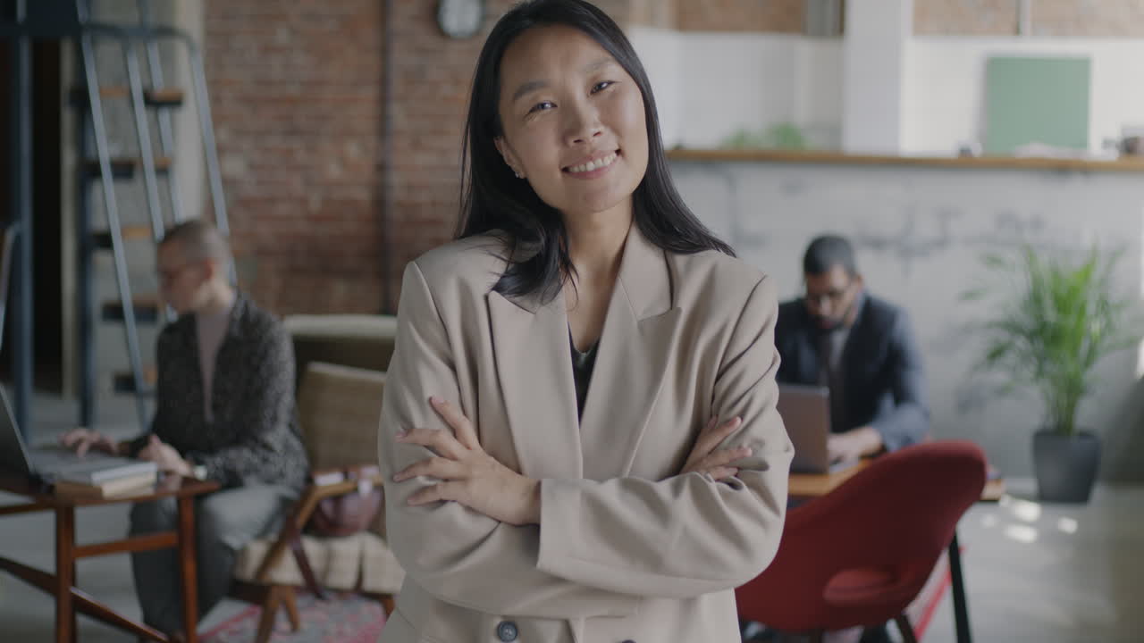 Woman in Business Attire at Office Meeting