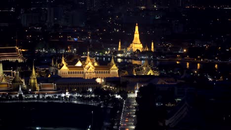 grand palace, temple of dawn and wat pho in bangkok city at night, thailand. 4k cityscape vdo