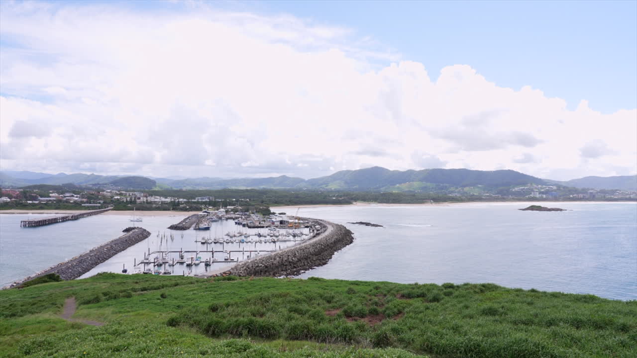 Wide shot of Coffs Harbour marina and coastline, New South Wales, Australia
