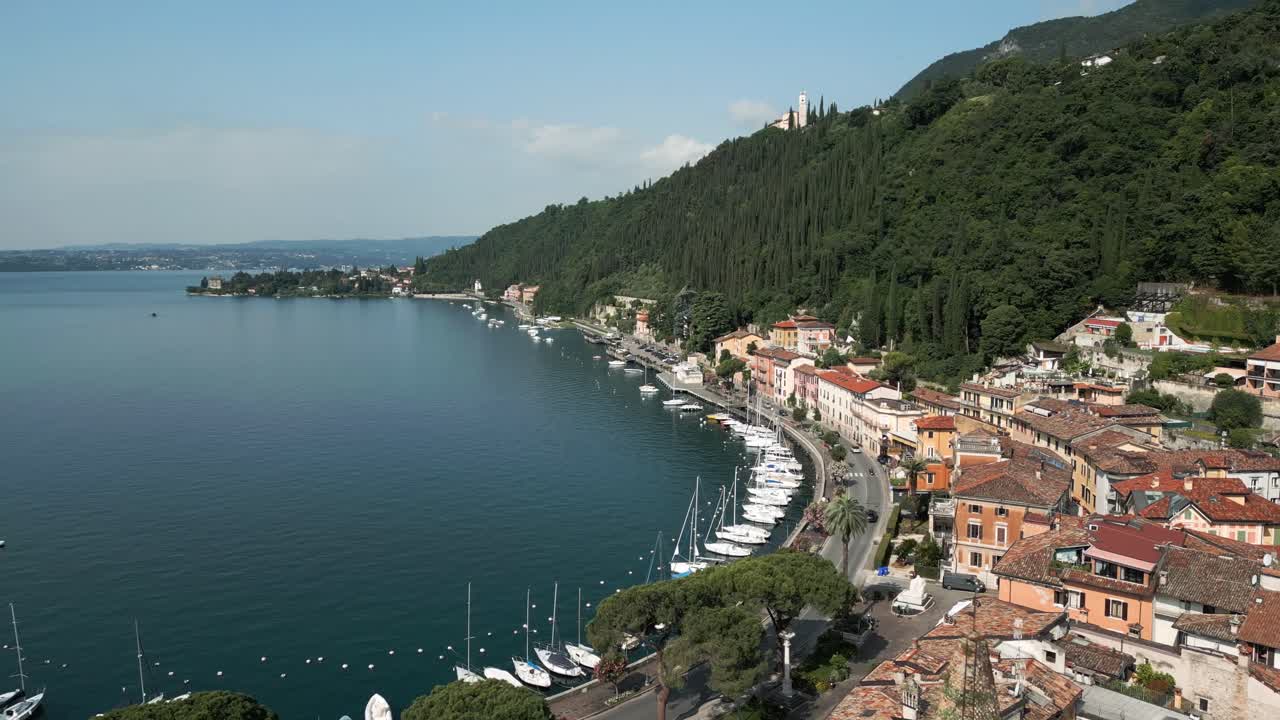 Drone shot over Toscolano Maderno, lining Lake Garda in Italy