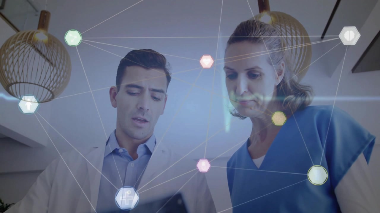 Medical colleagues tilting tablet and cycling ECG hexagon data visualization for chart review
