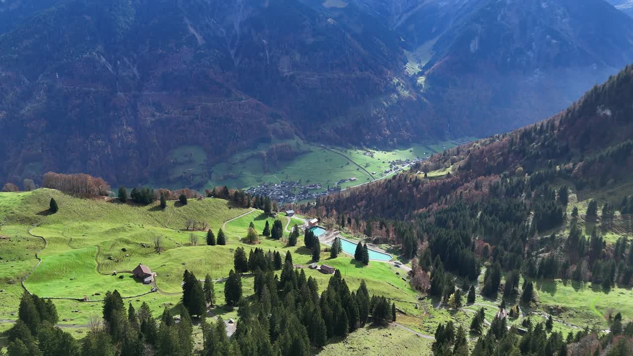 Stunning Aerial View of a Picturesque Alpine Valley in Switzerland