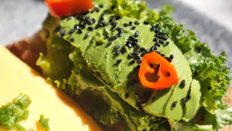 avocado toast with kale and chili pepper