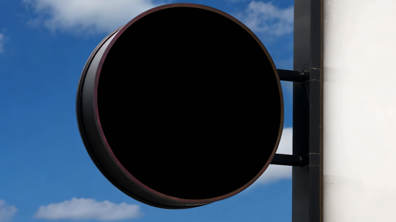 Blank Round Sign Against Blue Sky