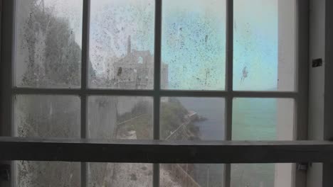 looking through window in alcatraz in slow motion