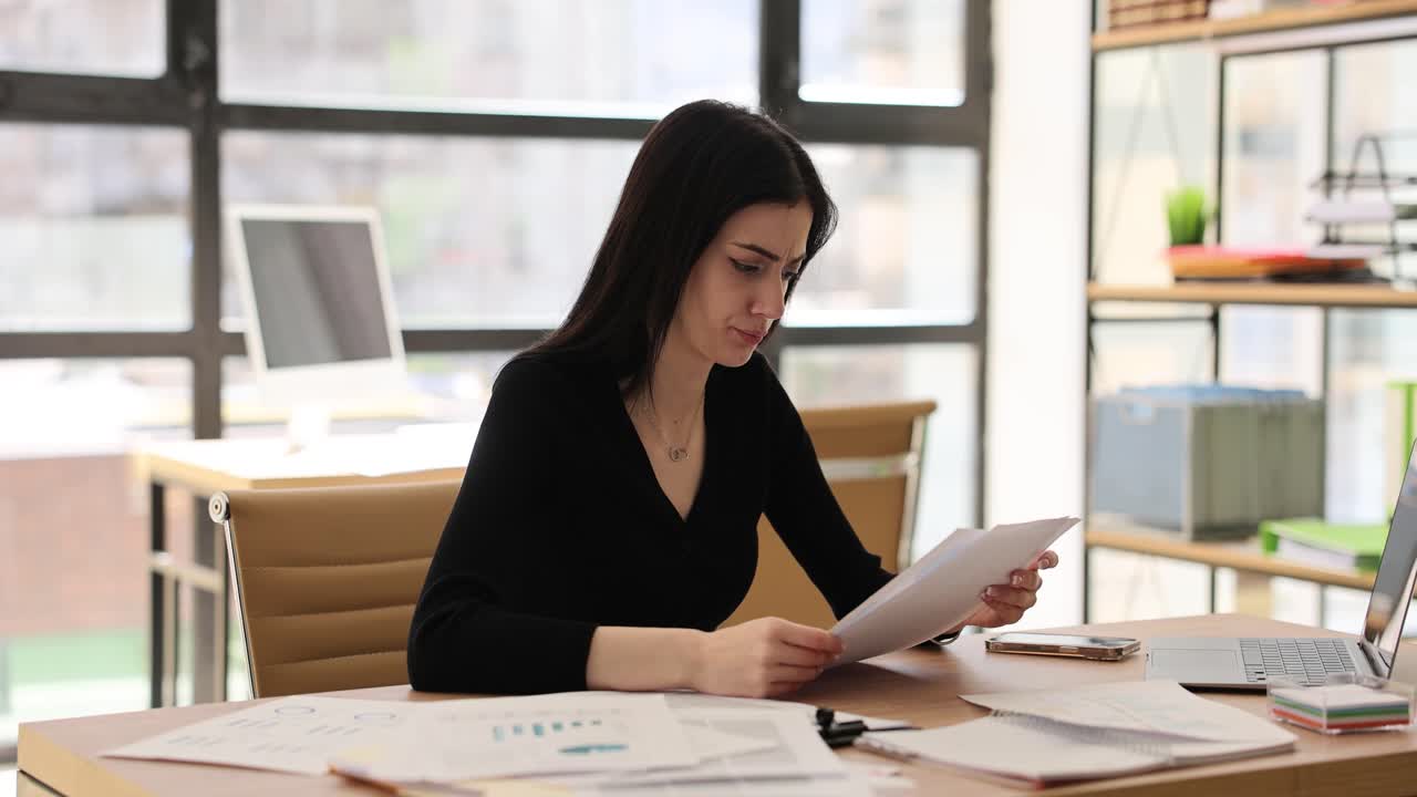 Stressed woman in the office