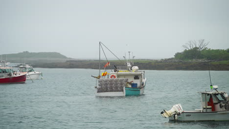classic lobster fishing boat in marina with fog rain and misty weather moody 4k 60p
