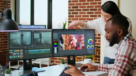 Diverse-mixed-race-couple-working-as-a-team-for-a-freelance-video-shoot